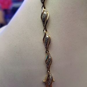 Women's 1/2 ctw tennis bracelet yellow gold.